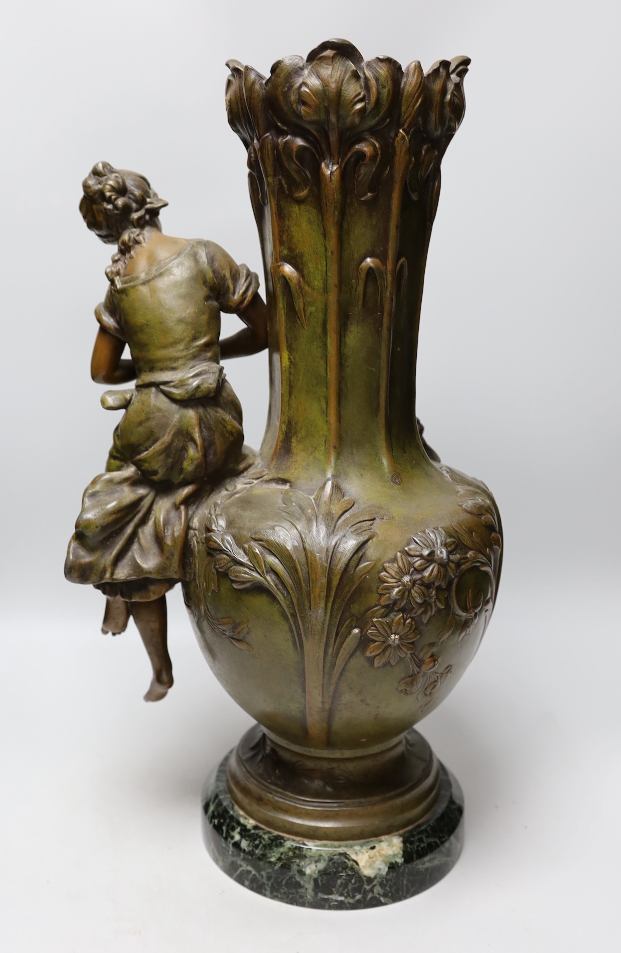 A French Art Nouveau patinated spelter figural vase, on marble stand, stamped Aug. Moreau with foundry stamp, 50cms